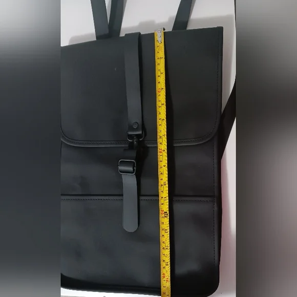 Rains Black Minimalist Backpack with Flap Closure